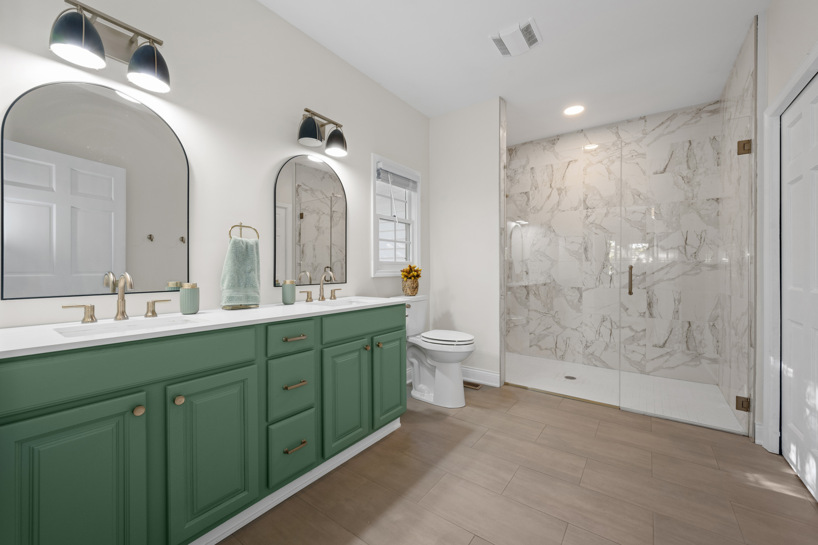 408 Delaware Circle Bolingbrook, IL 60440 - Photo 24 of 47 a spacious bathroom with a double vanity sink mirror and toilet