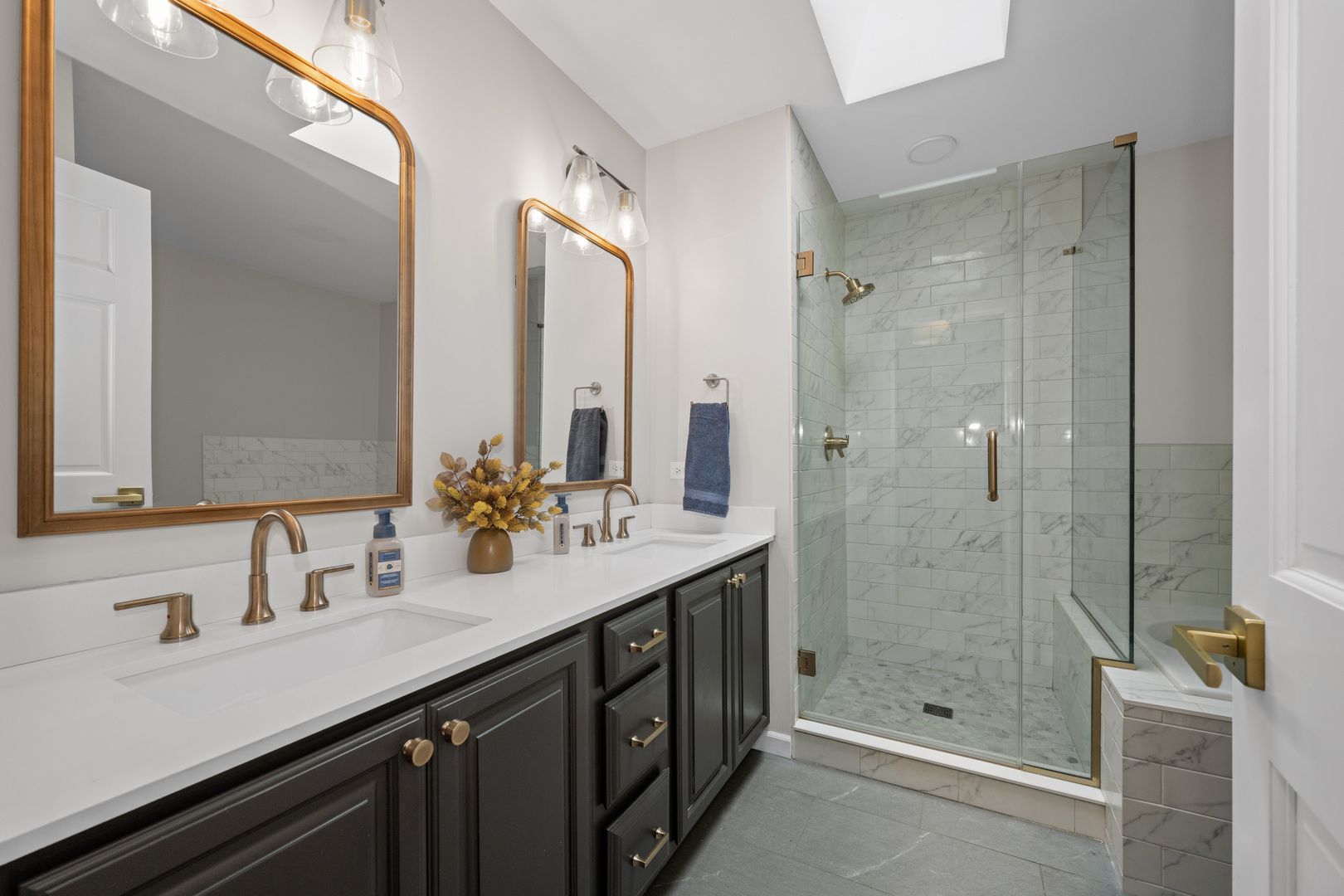 408 Delaware Circle Bolingbrook, IL 60440 - Photo 31 of 47 a bathroom with a double vanity sink mirror double and shower