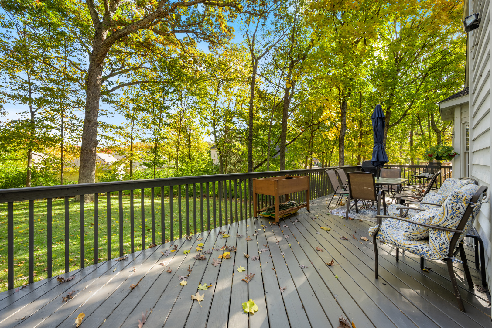 408 Delaware Circle Bolingbrook, IL 60440 - Photo 33 of 47 a view of balcony with chairs and wooden fence