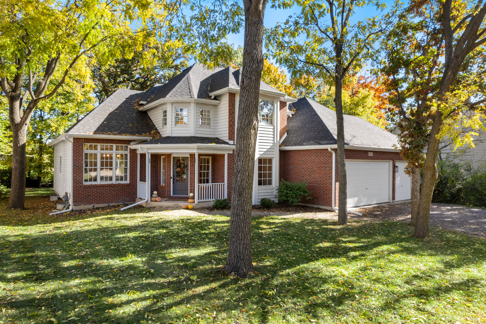 408 Delaware Circle Bolingbrook, IL 60440 - Photo 35 of 47 a front view of a house with a yard and garage