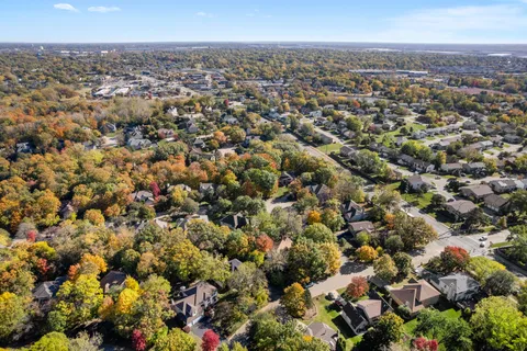 an aerial view of a city with lots of residential buildings