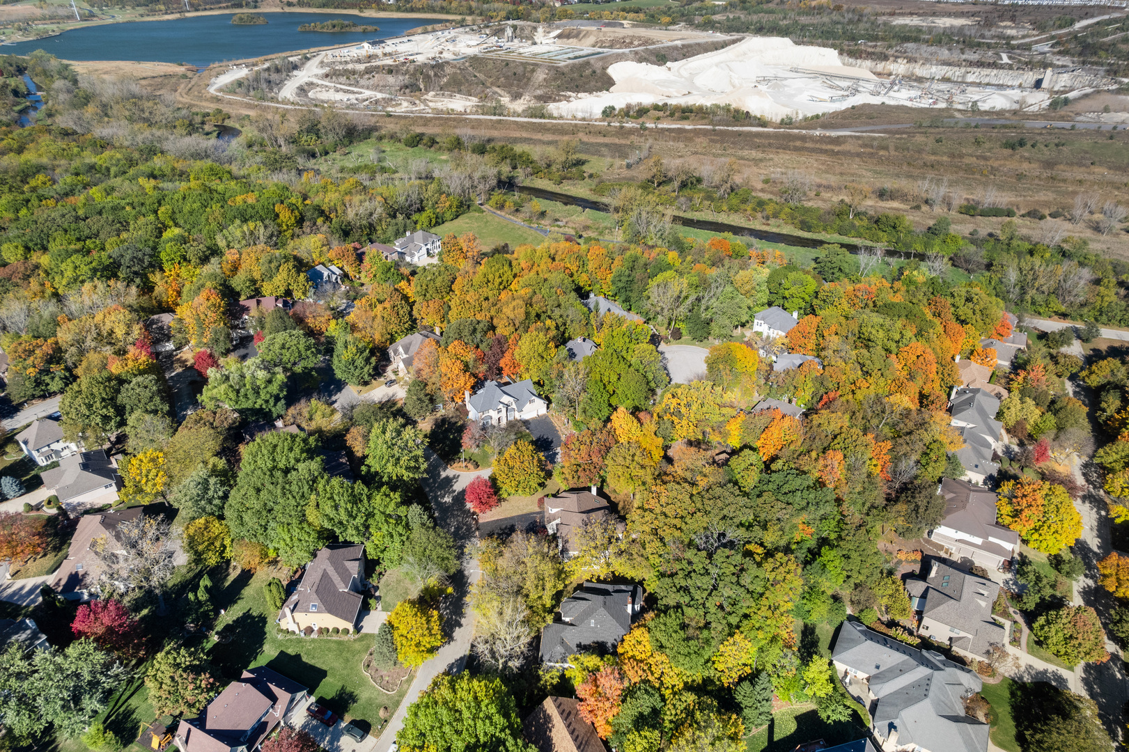 408 Delaware Circle Bolingbrook, IL 60440 - Photo 4 of 47 a view of a lake with lots of trees