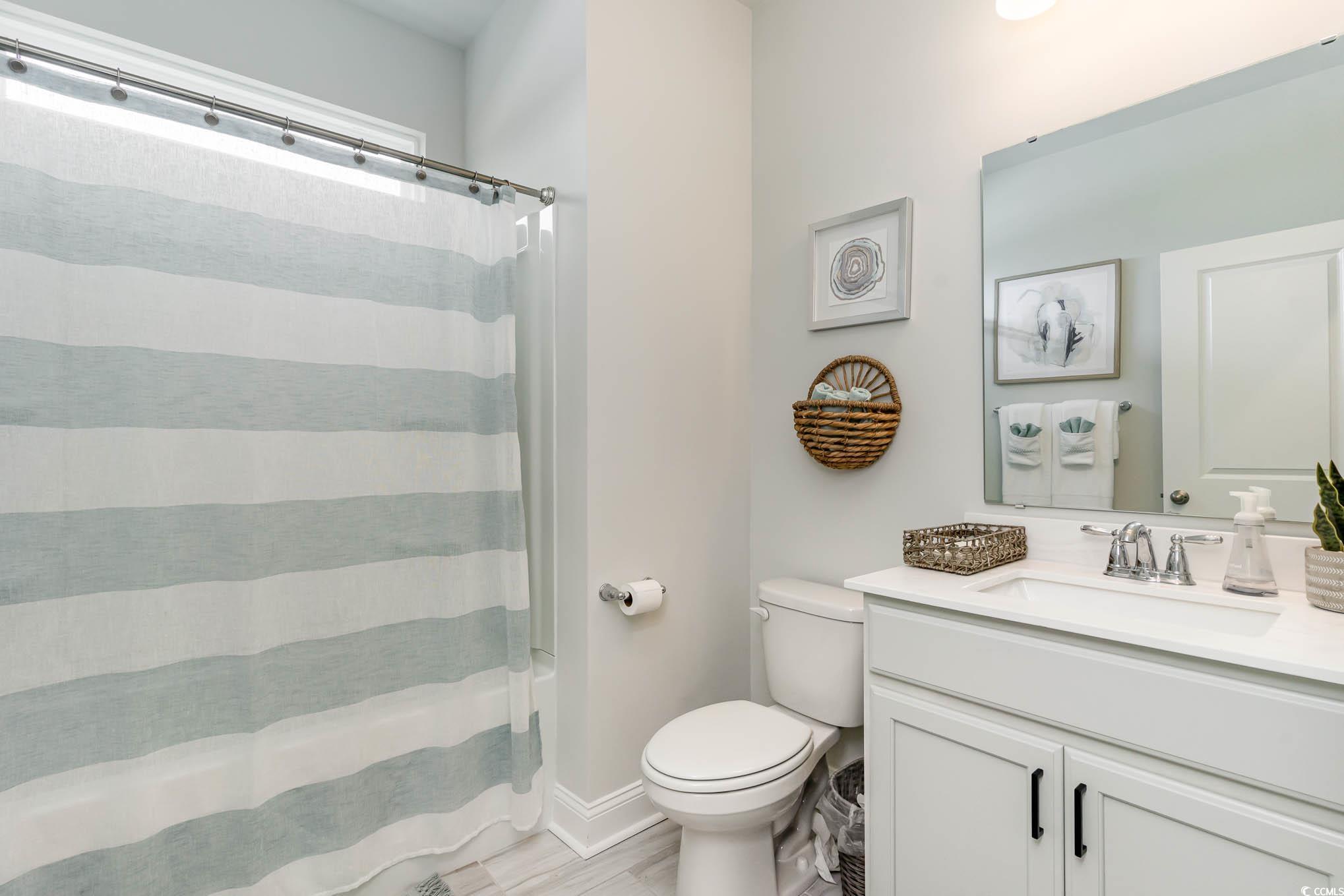 748 Doonbeg Court Conway, SC 29526 - Photo 14 of 30 Bathroom featuring toilet and vanity