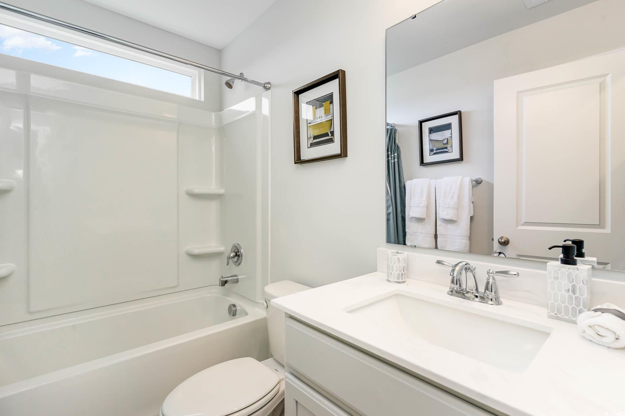 748 Doonbeg Court Conway, SC 29526 - Photo 28 of 30 Full bathroom featuring vanity and bathing tub / shower combination