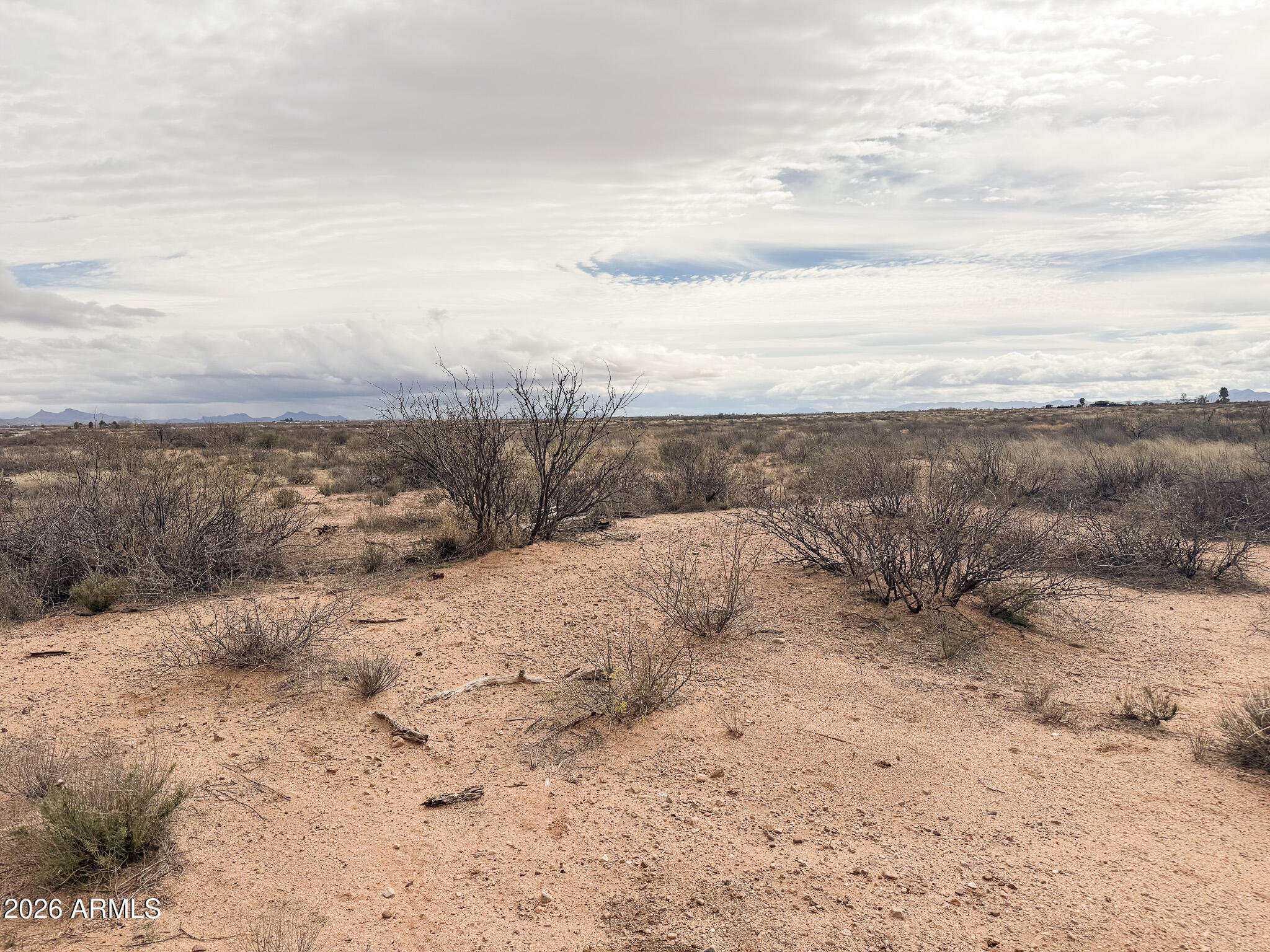 Tbd East Davis Road McNeal, AZ 85617 - Photo 4 of 5 a view of a dry yard with wooden fence