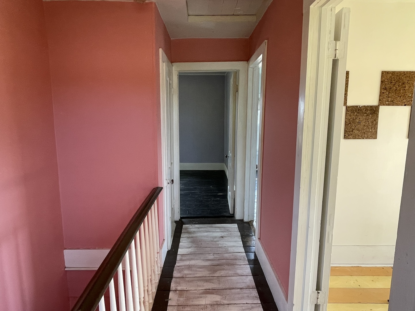 6808 South Oak Grove Road Harvard, IL 60033 - Photo 12 of 18 a view of a hallway with wooden floor and staircase