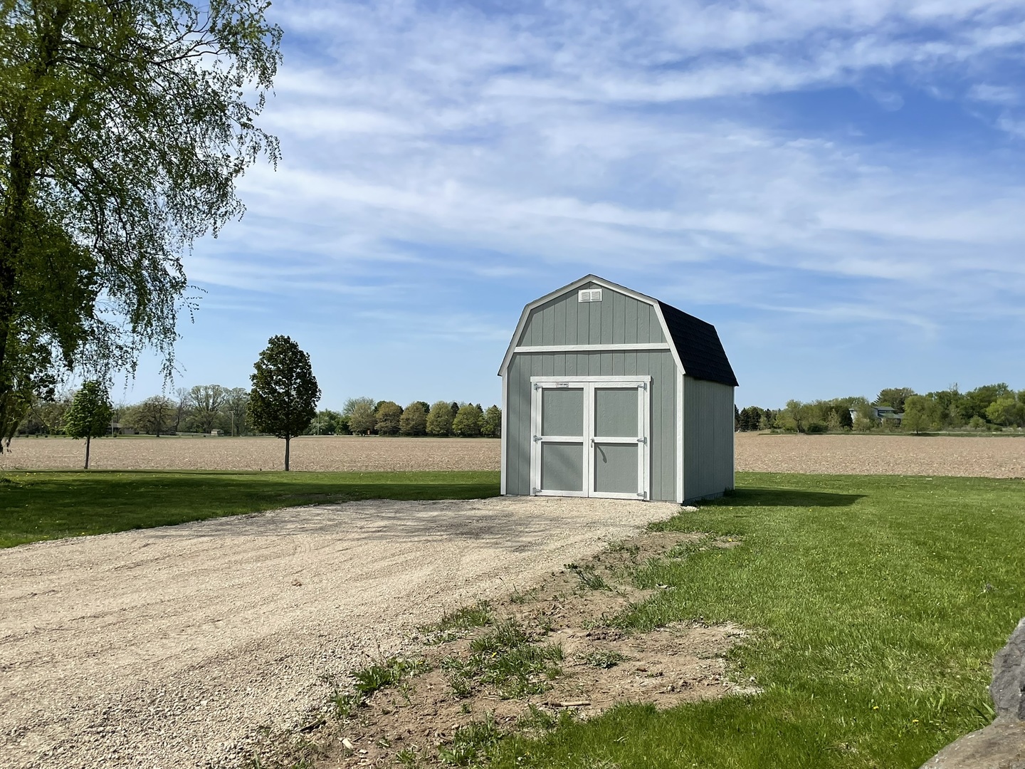 6808 South Oak Grove Road Harvard, IL 60033 - Photo 16 of 18 a view of a garden with an trees