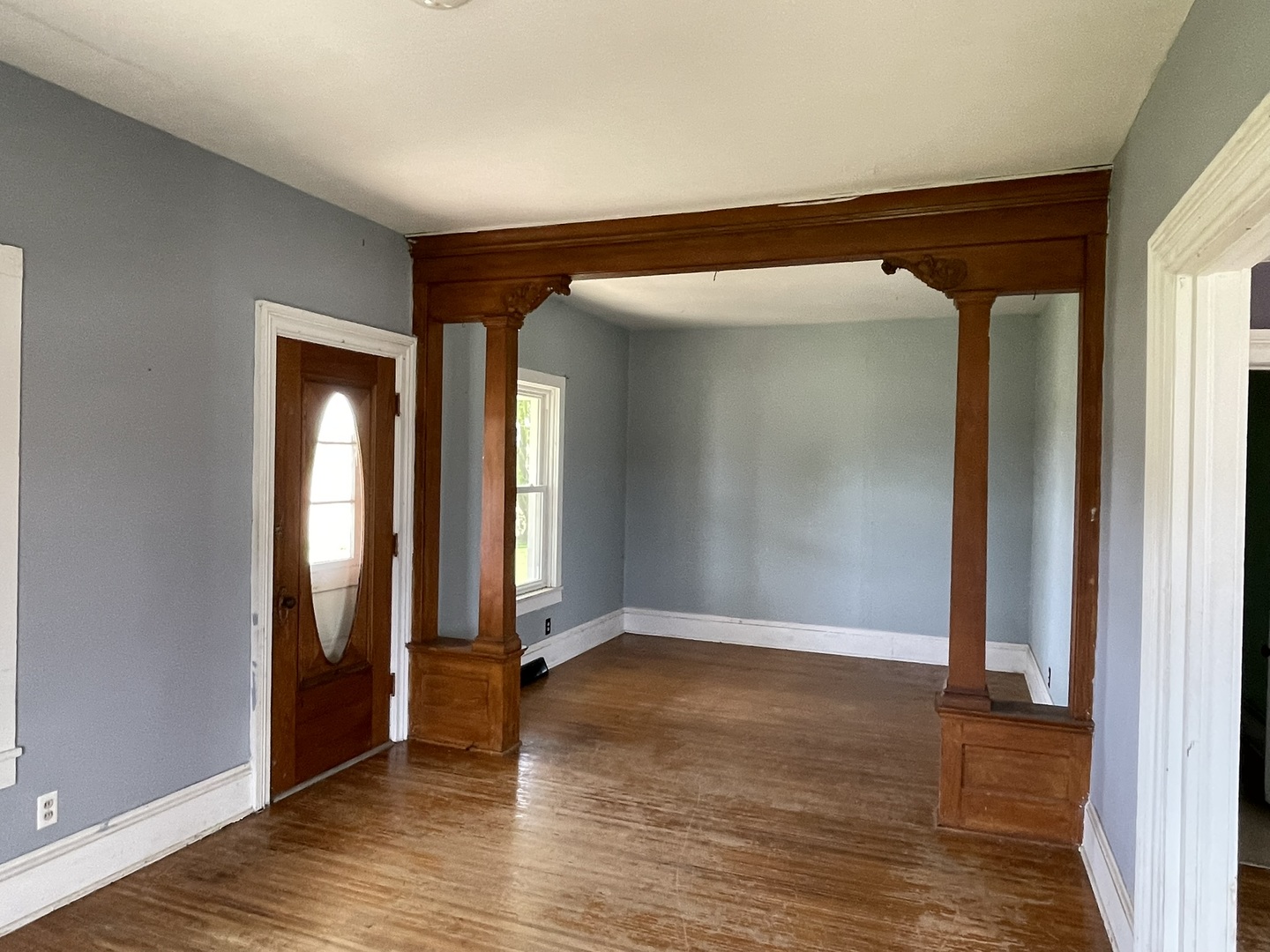 6808 South Oak Grove Road Harvard, IL 60033 - Photo 5 of 18 an empty room with wooden floor and closet