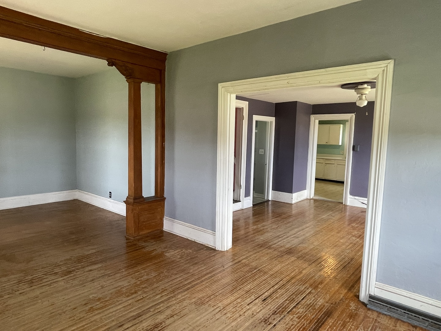 6808 South Oak Grove Road Harvard, IL 60033 - Photo 7 of 18 a view of a hallway with wooden floor