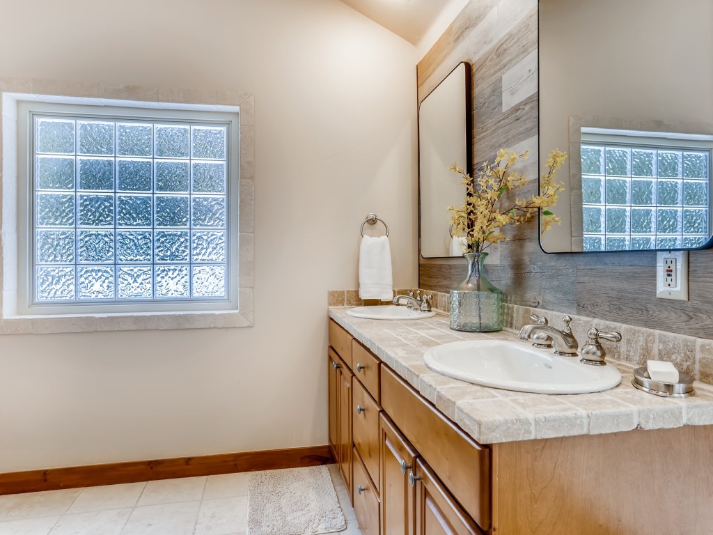 344 Rena Road Breckenridge, CO 80424 - Photo 15 of 32 Large master bathroom with double sinks & walk in closet.