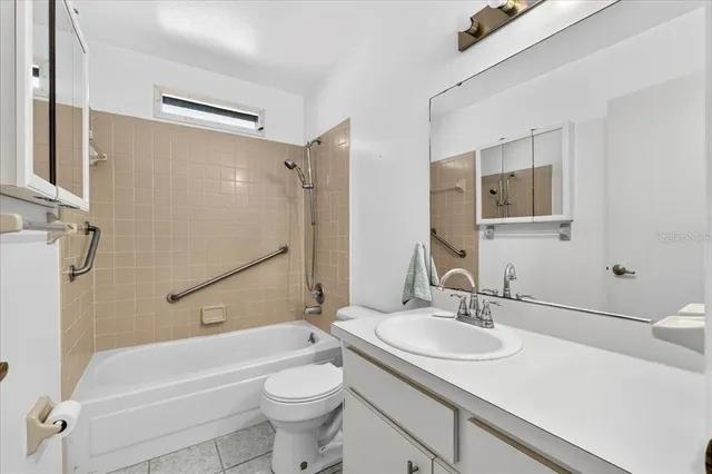 a bathroom with a sink toilet and a bathtub
