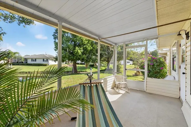 a view of swimming pool from a balcony