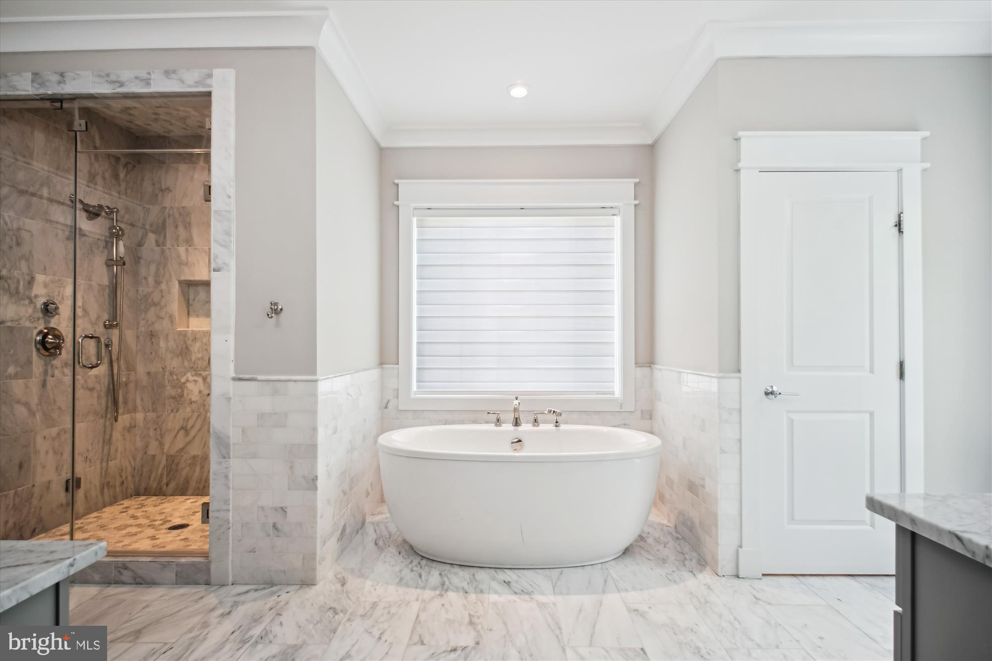 1565 Hane Street McLean, VA 22101 - Photo 15 of 43 a view of a bathroom with a bathtub and shower