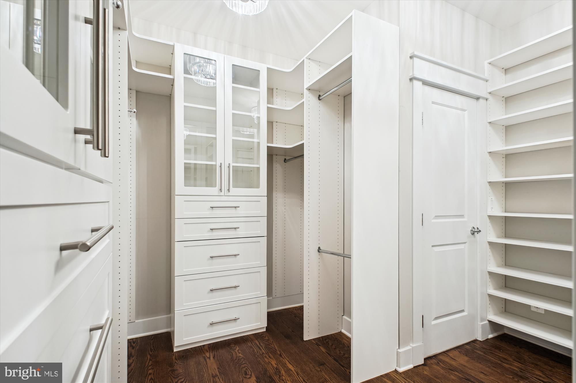 1565 Hane Street McLean, VA 22101 - Photo 18 of 43 a view of walk in closet with empty racks