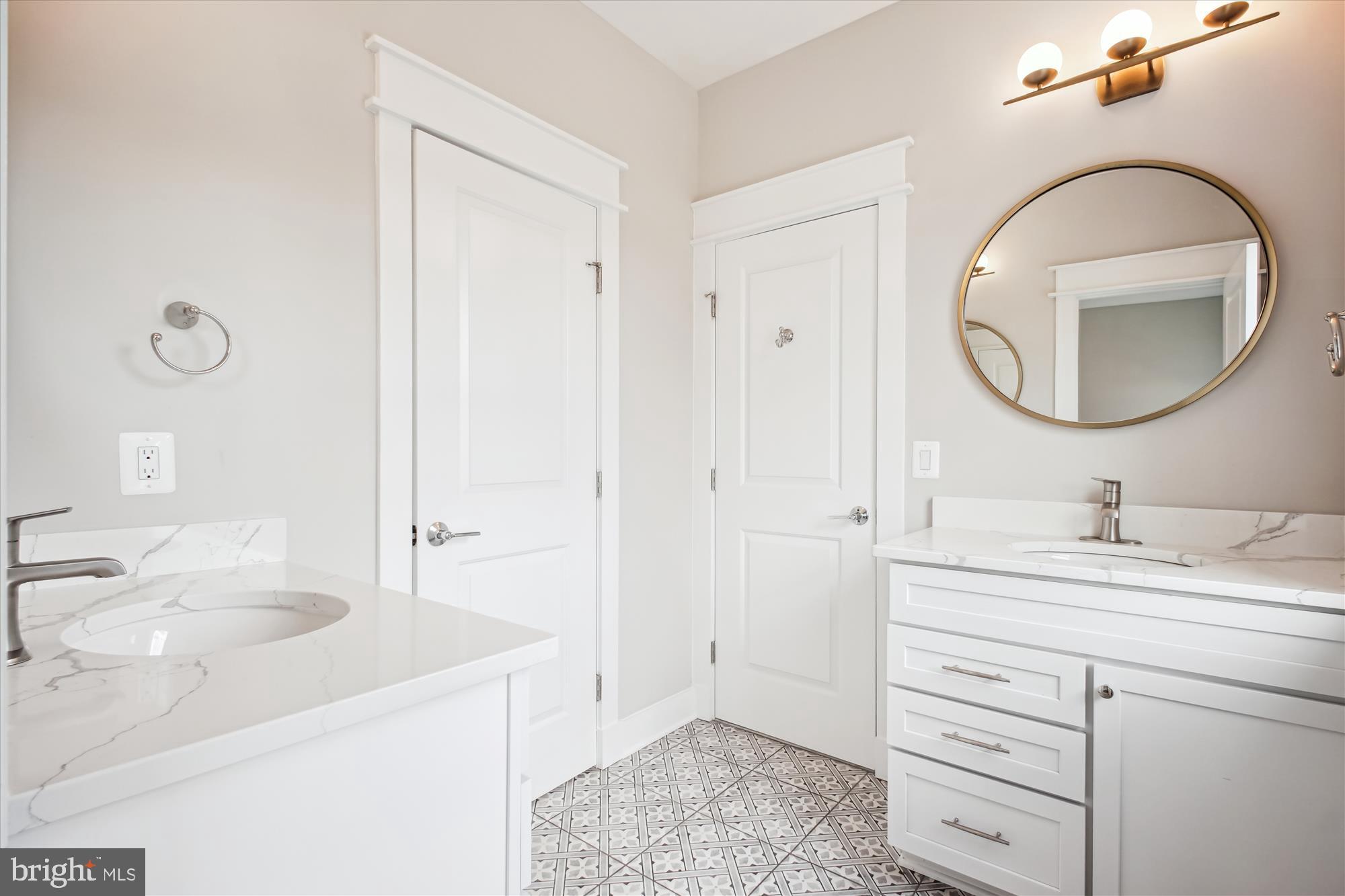 1565 Hane Street McLean, VA 22101 - Photo 20 of 43 a bathroom with a sink and a mirror