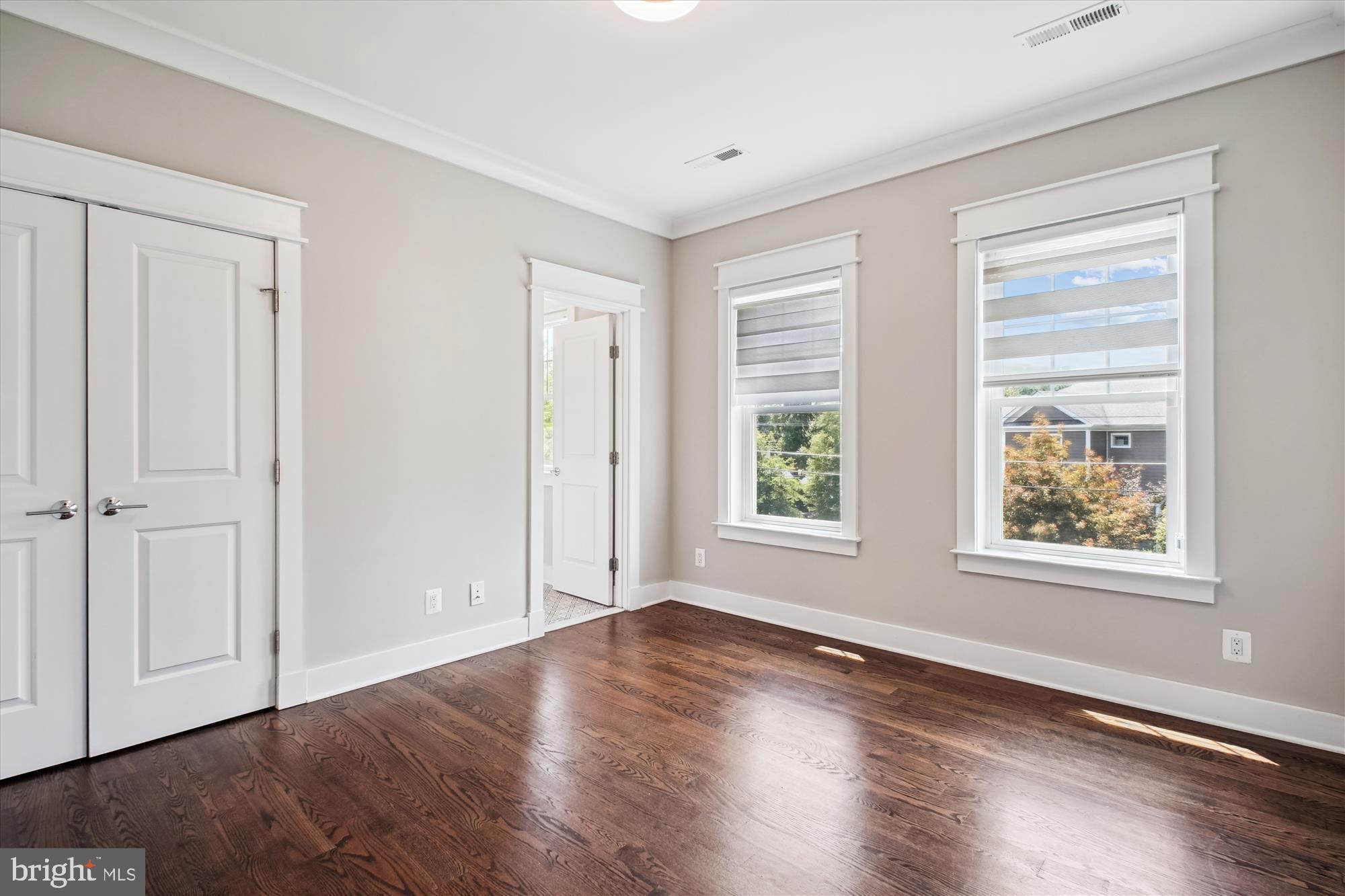 1565 Hane Street McLean, VA 22101 - Photo 22 of 43 a view of an empty room with wooden floor and a window