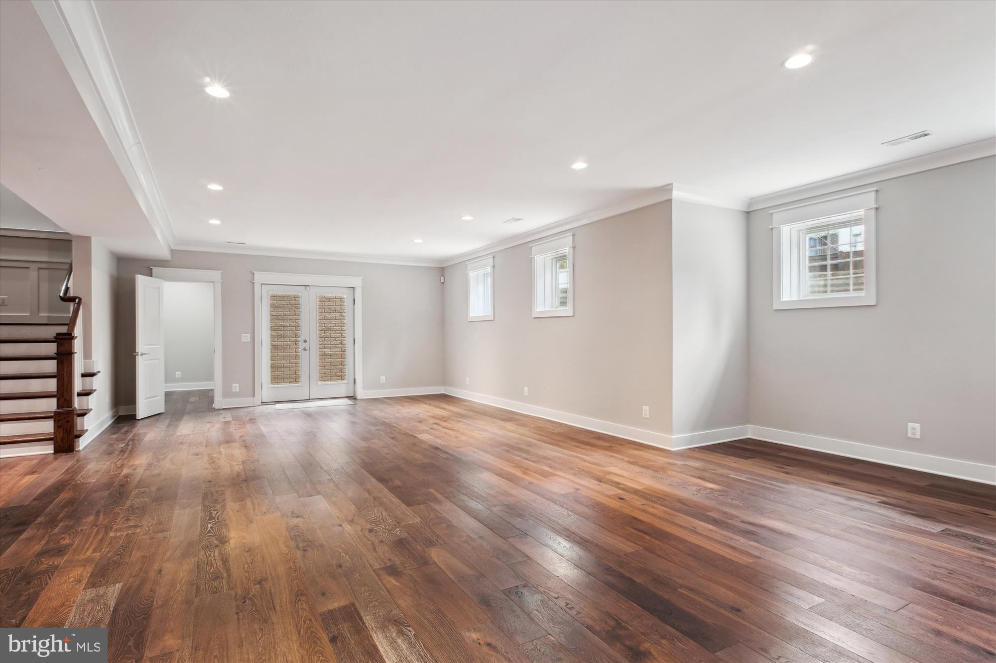 1565 Hane Street McLean, VA 22101 - Photo 28 of 43 a view of an empty room with wooden floor and a window