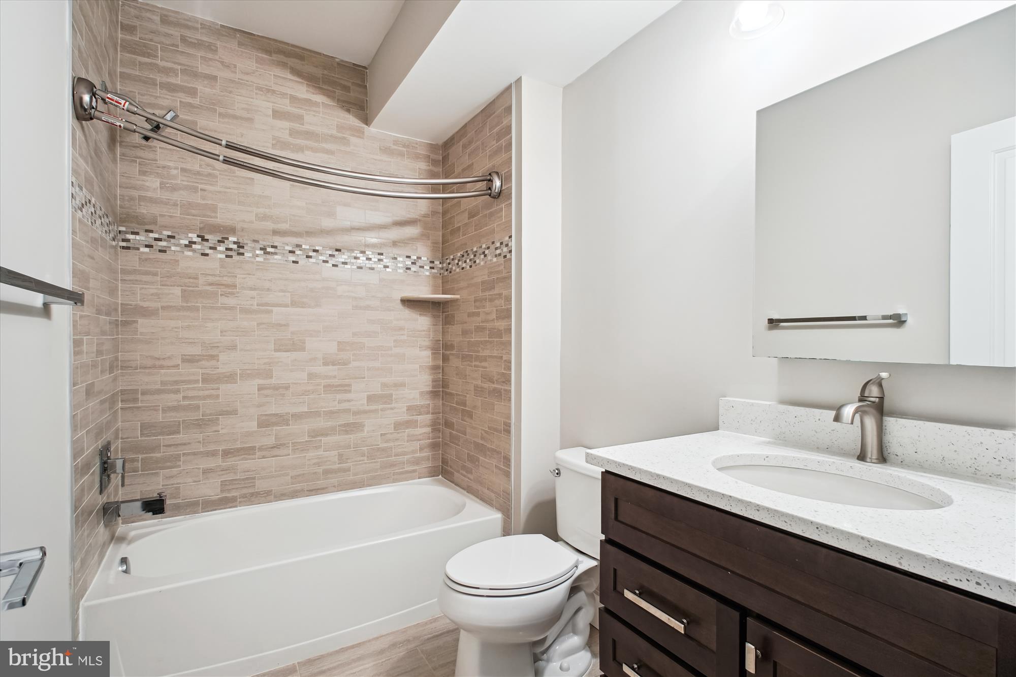 1565 Hane Street McLean, VA 22101 - Photo 29 of 43 a bathroom with a sink a toilet and a bathtub