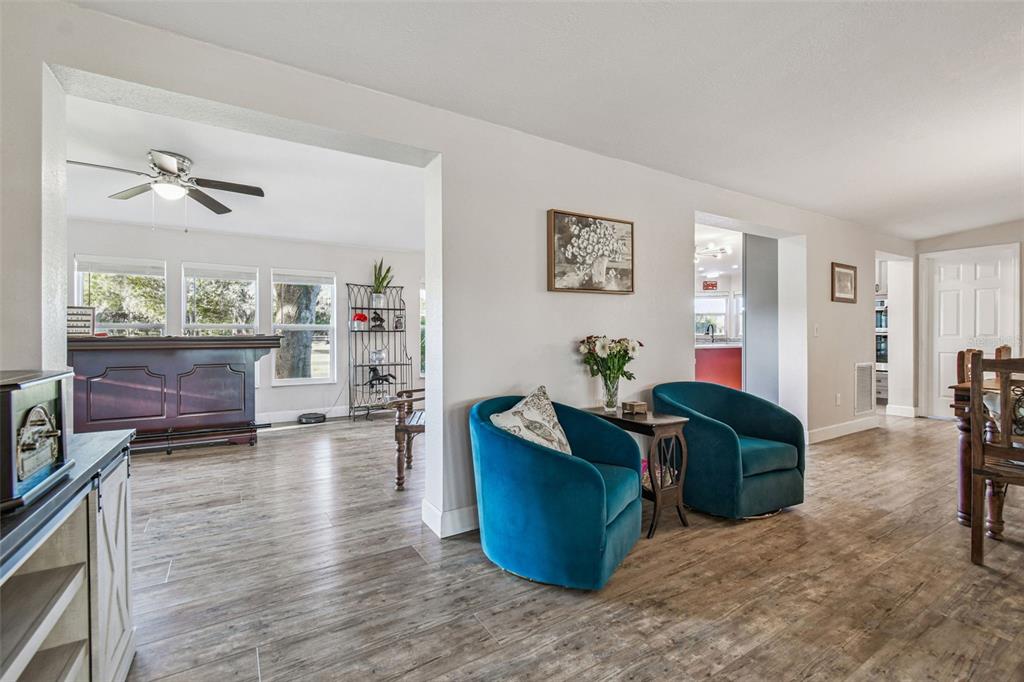 12714 Tyler Run Avenue Odessa, FL 33556 - Photo 14 of 65 a view of workspace with furniture and wooden floor