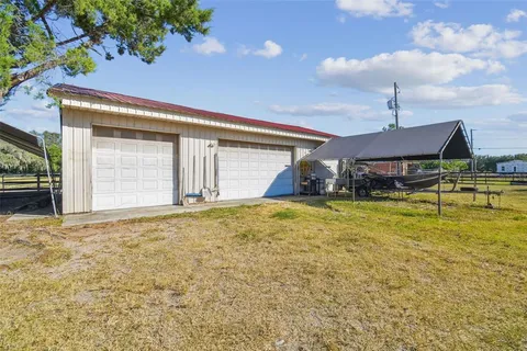 a kitchen with stainless steel appliances granite countertop a stove and cabinets