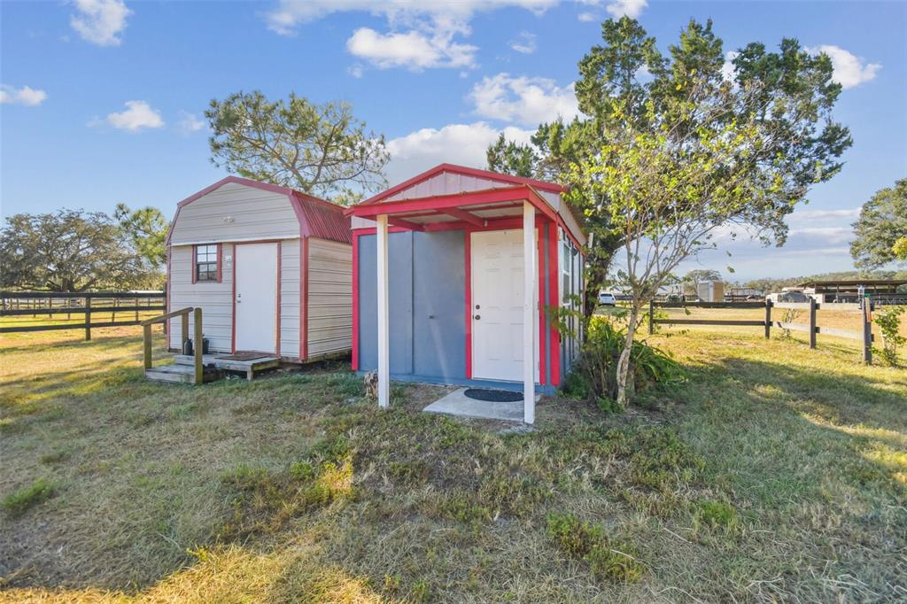 12714 Tyler Run Avenue Odessa, FL 33556 - Photo 27 of 65 a view of a house with a yard