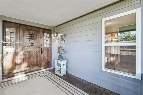 a bedroom with a bed and a desk