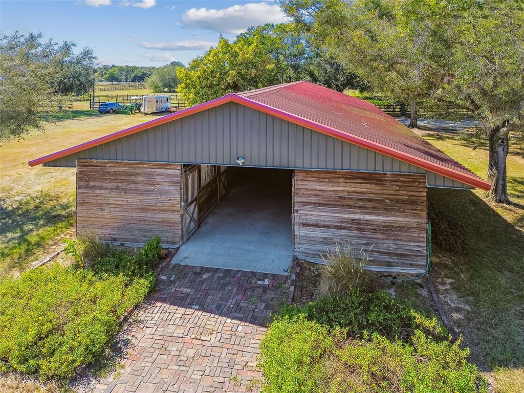 12714 Tyler Run Avenue Odessa, FL 33556 - Photo 58 of 65 a front view of a house with a yard