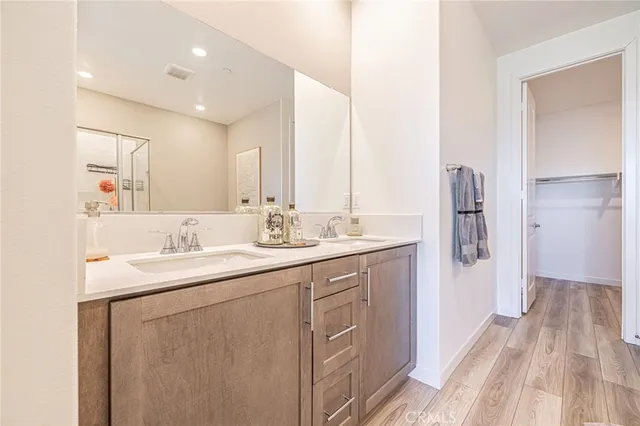 a bath room with a bathtub and a shower