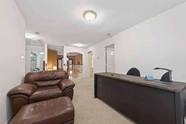 a living room with furniture and a couch