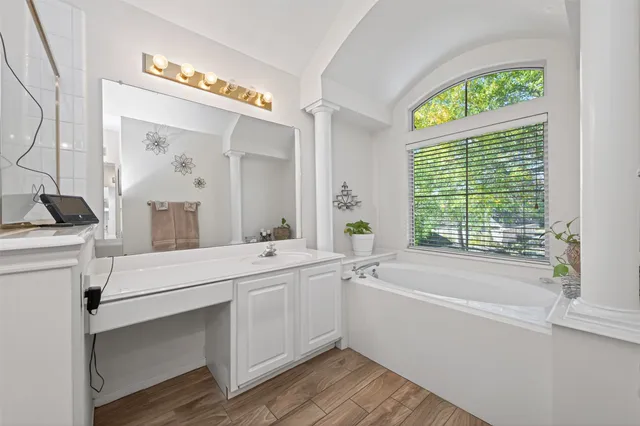 a bathroom with a sink and a bathtub