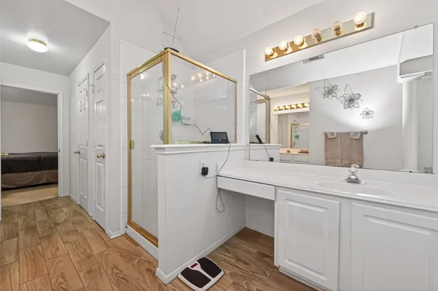a bathroom with a sink and a mirror