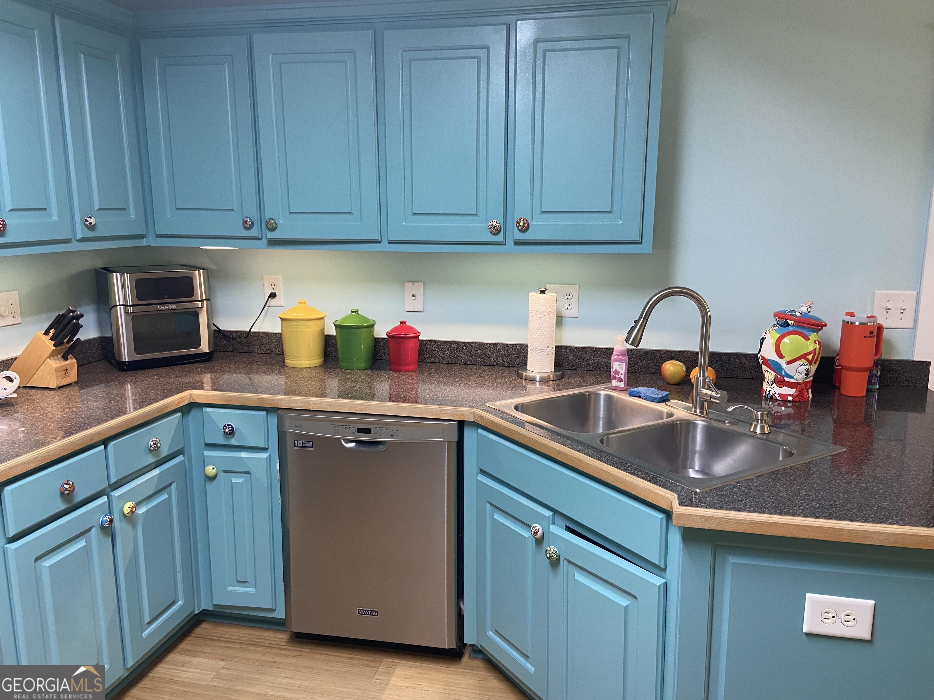 879 Hawk Creek Trail Winder, GA 30680 - Photo 12 of 30 a kitchen with sink cabinets and utility
