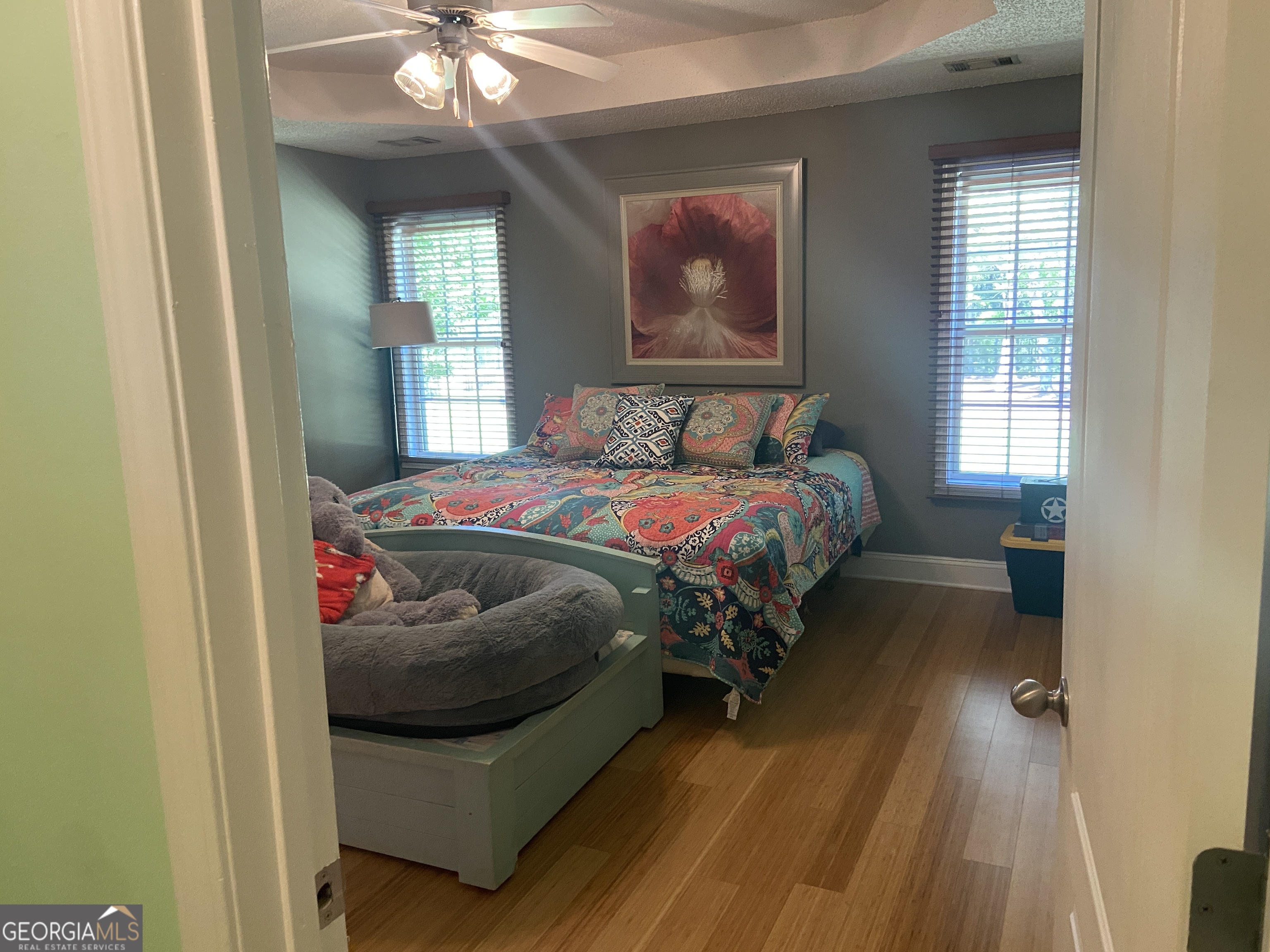 879 Hawk Creek Trail Winder, GA 30680 - Photo 14 of 30 a bedroom with a bed and window