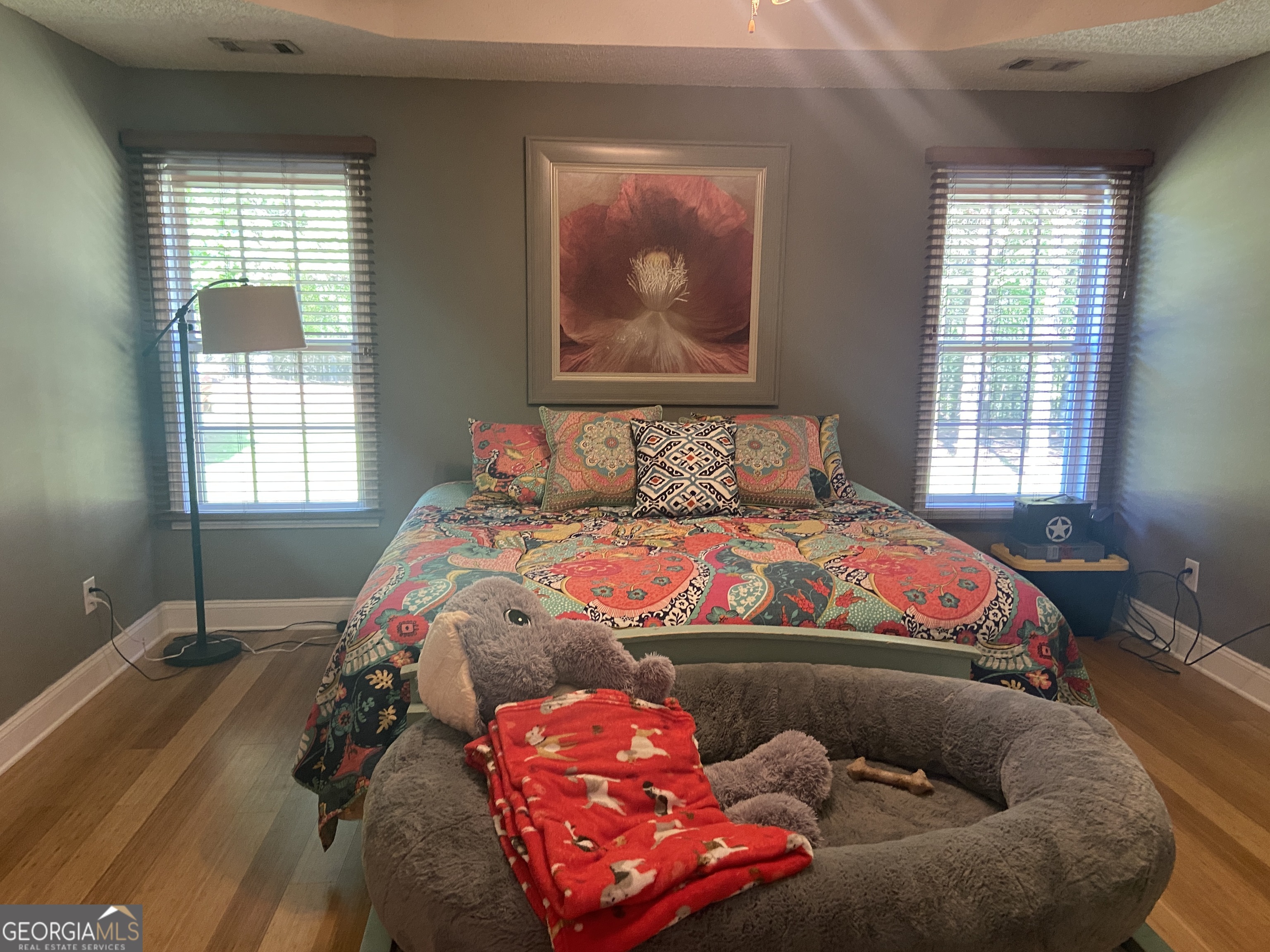 879 Hawk Creek Trail Winder, GA 30680 - Photo 16 of 30 a bedroom with a bed and window