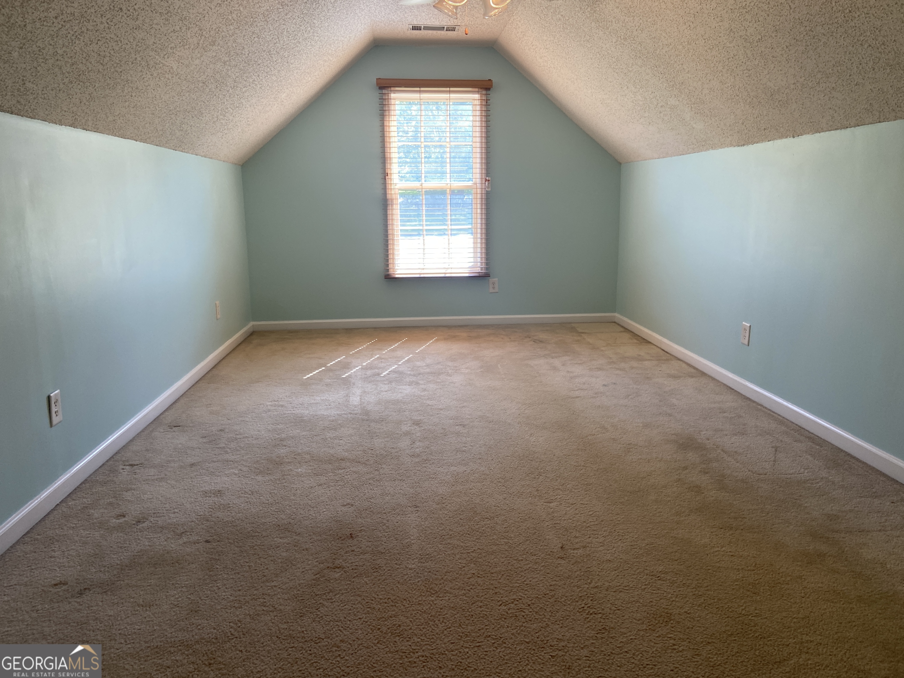 879 Hawk Creek Trail Winder, GA 30680 - Photo 22 of 30 an empty room with a window