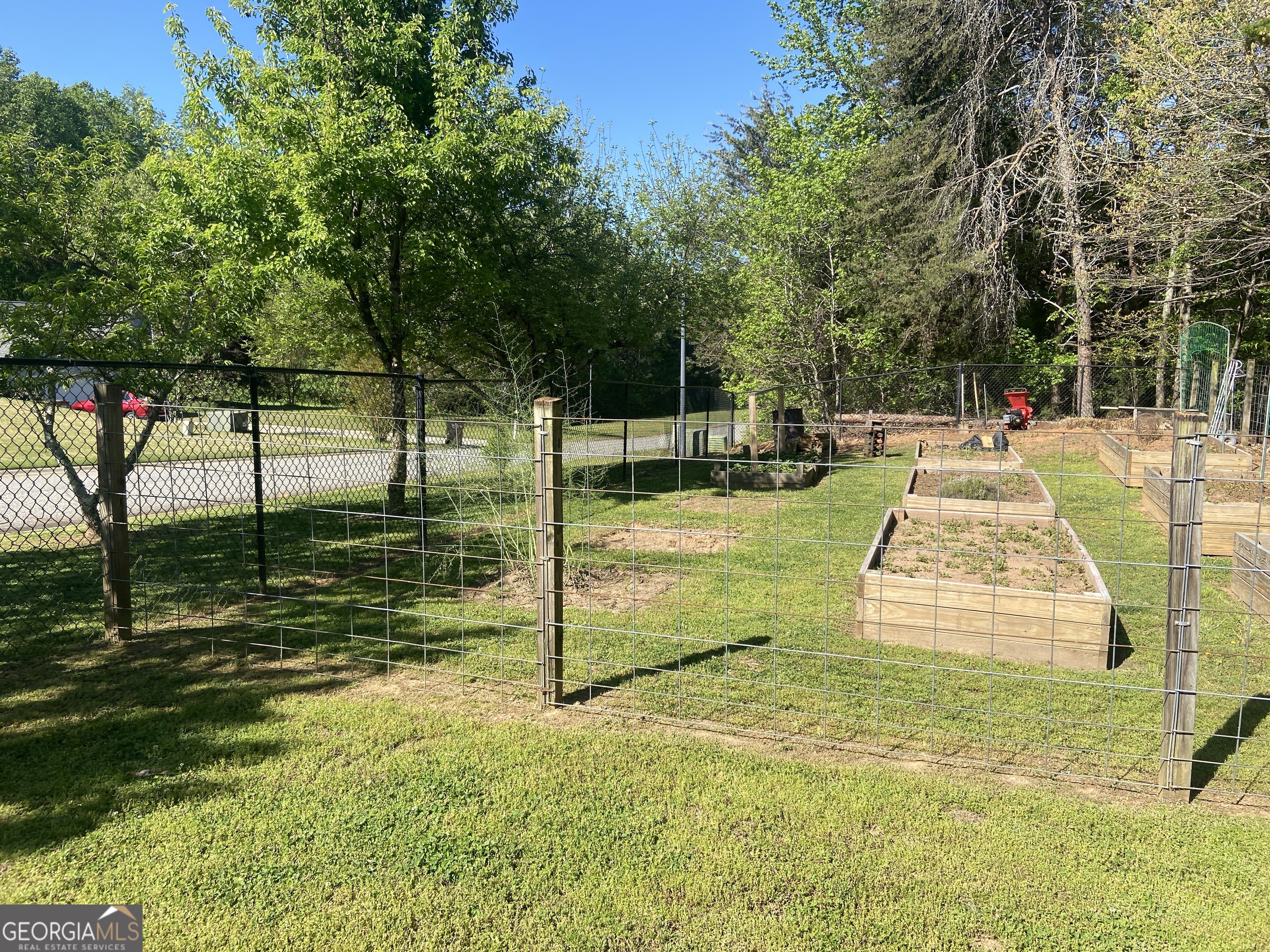 879 Hawk Creek Trail Winder, GA 30680 - Photo 25 of 30 a view of a swimming pool with a patio