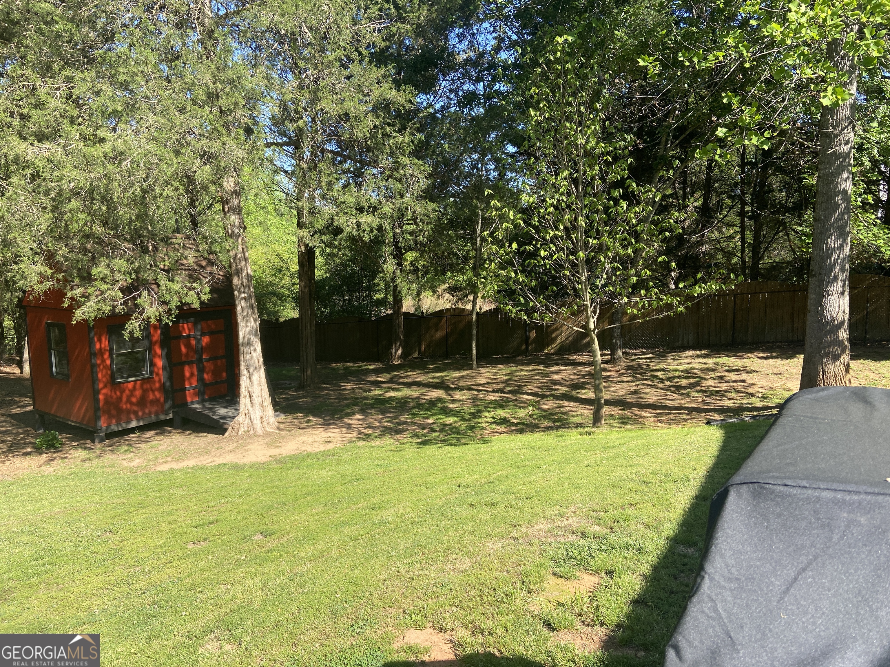 879 Hawk Creek Trail Winder, GA 30680 - Photo 29 of 30 a view of a swimming pool with a patio