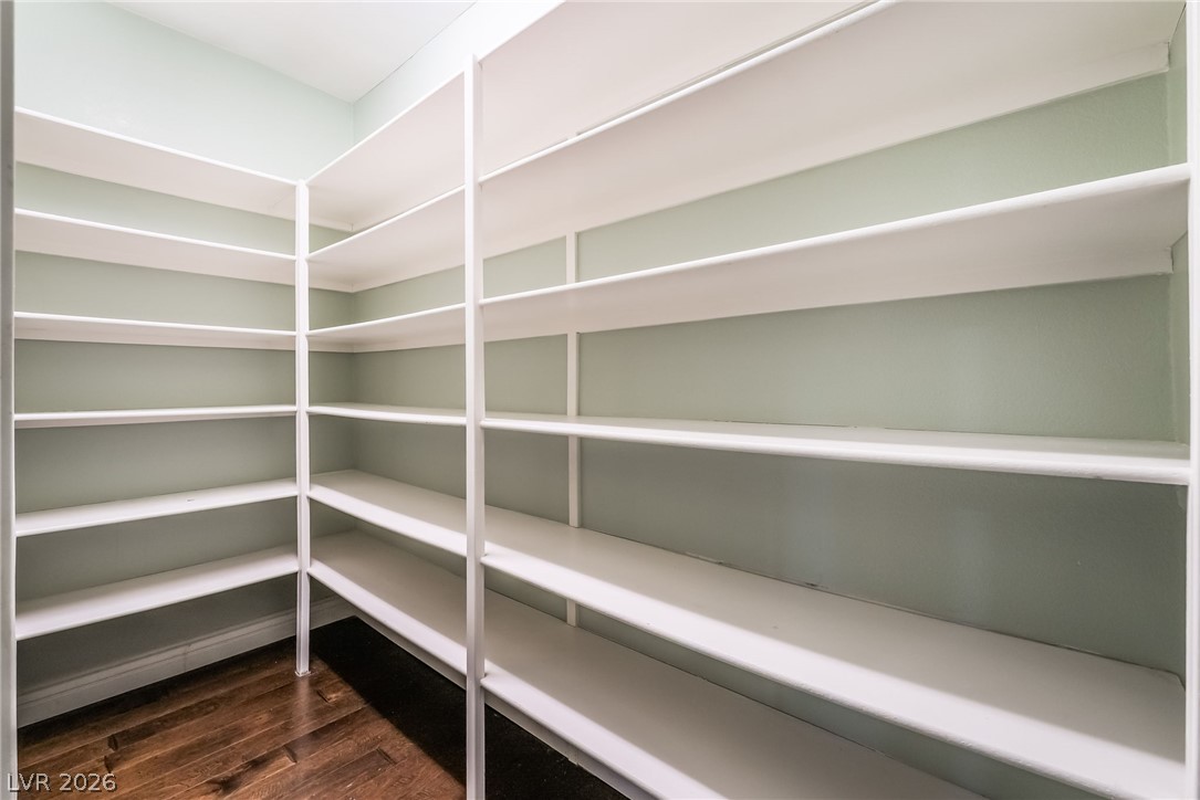 261 Timber Hollow Street Henderson, NV 89012 - Photo 16 of 51 Ample built-in shelving provides generous storage in this functional pantry.