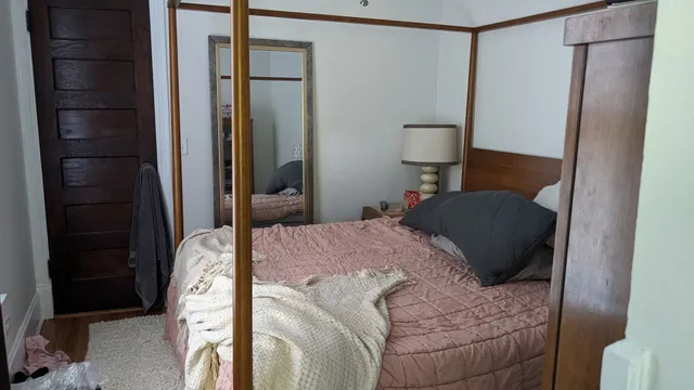 a kitchen with a stove a sink and a window