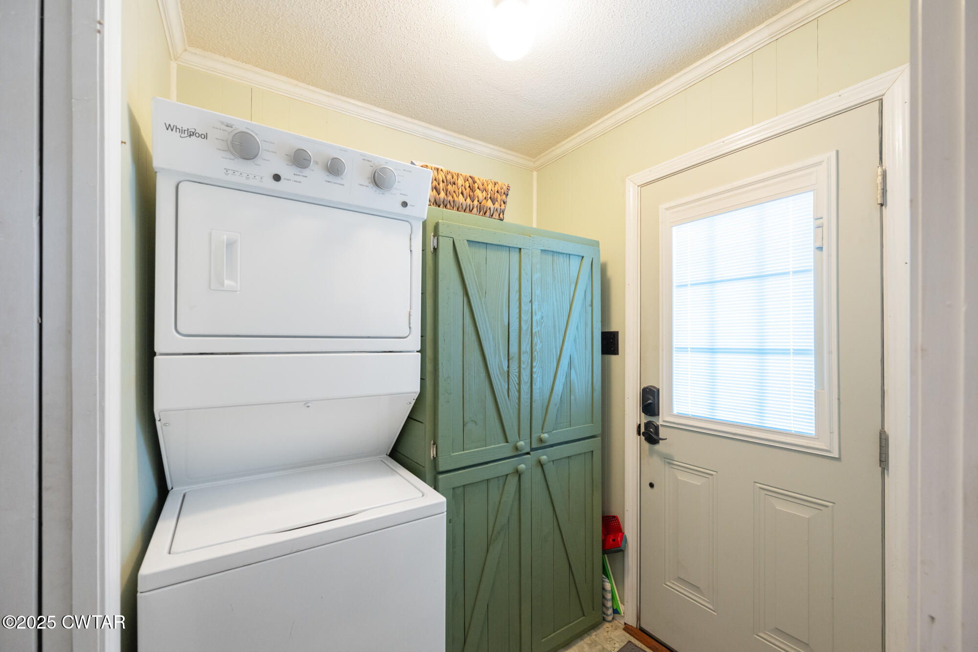 982 Lost Creek Boat Dock Road Decaturville, TN 38329 - Photo 19 of 31 a utility room with dryer and washer