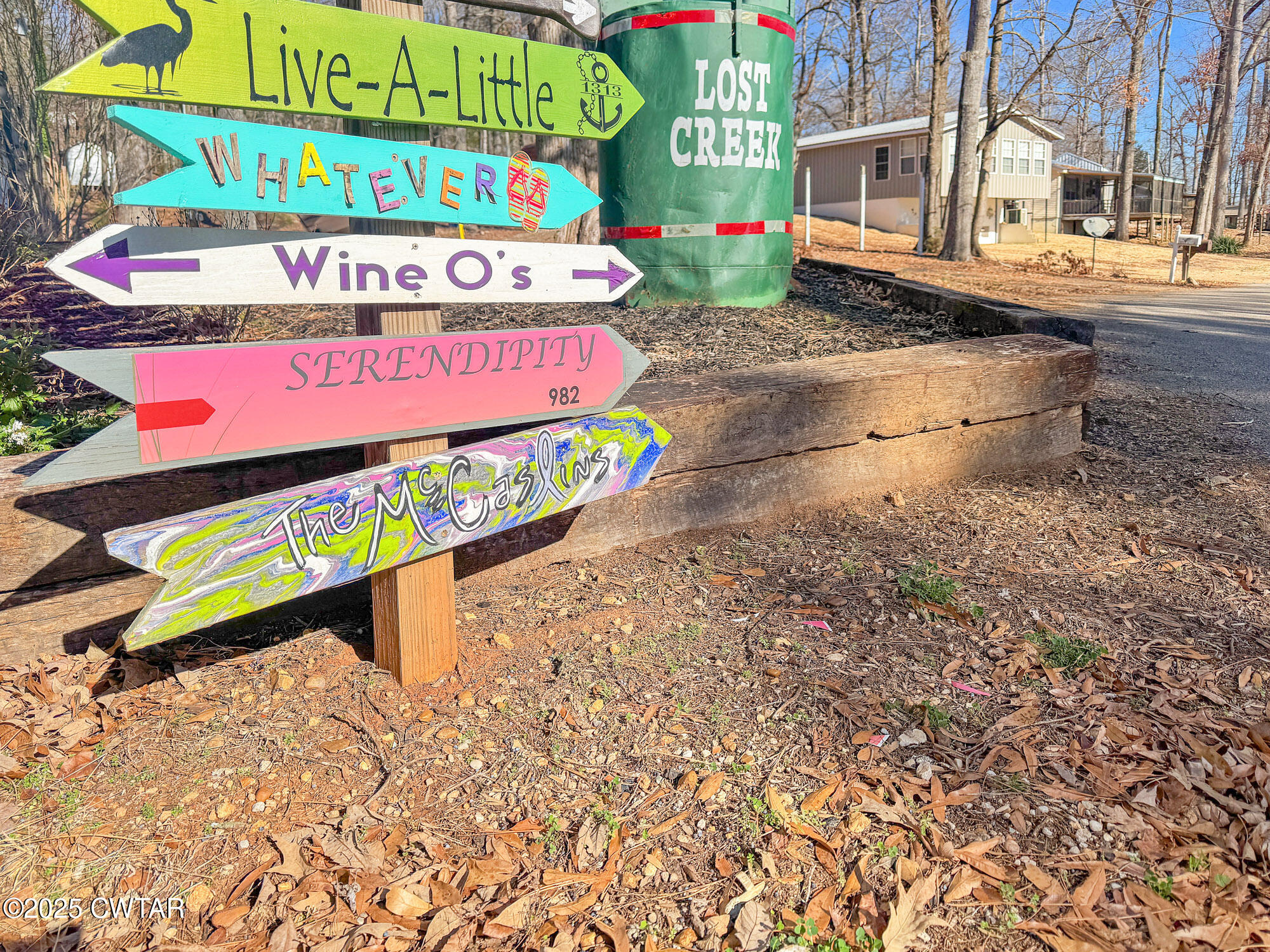 982 Lost Creek Boat Dock Road Decaturville, TN 38329 - Photo 25 of 31 a view of outdoor space with sign board