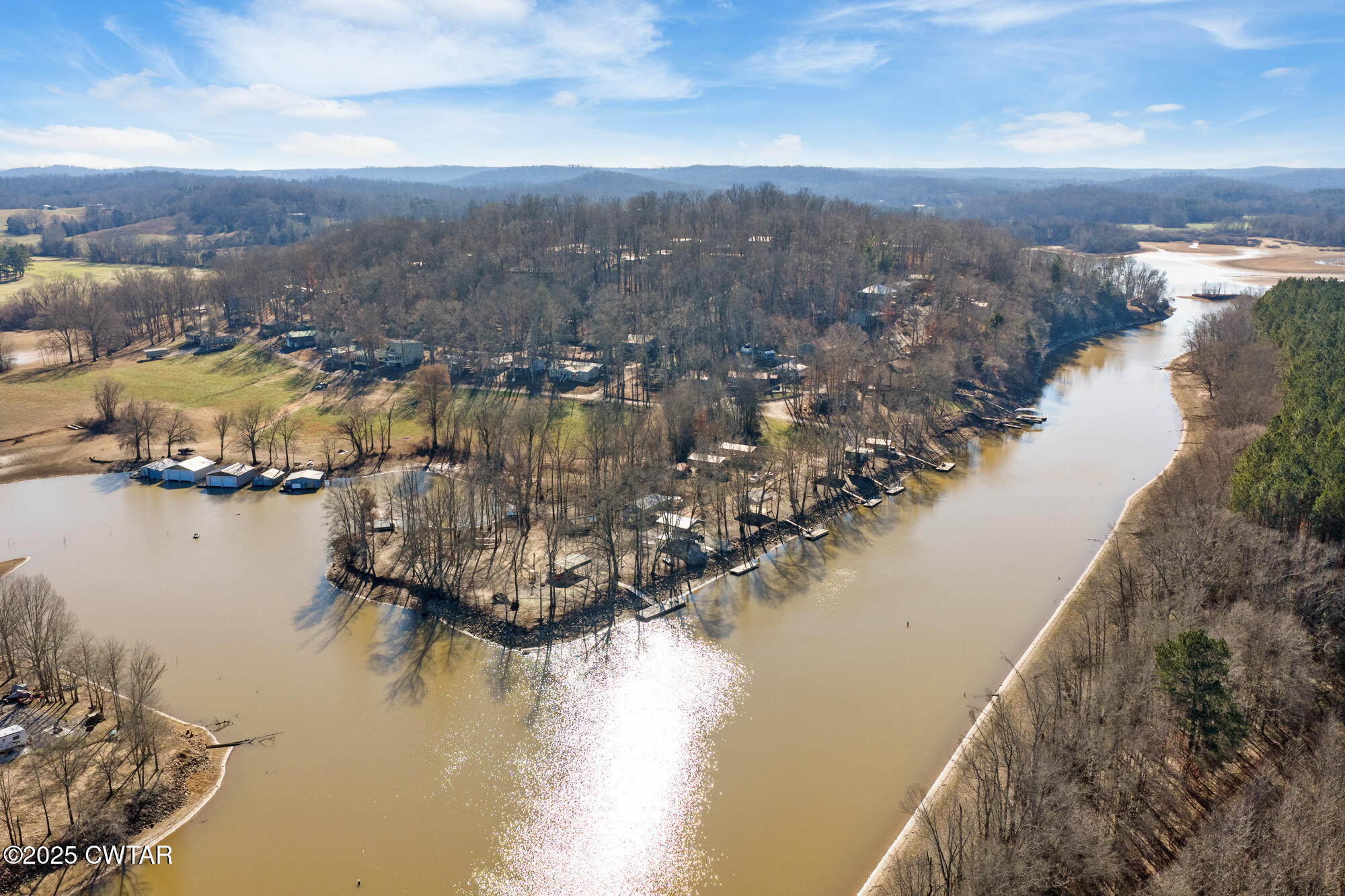 982 Lost Creek Boat Dock Road Decaturville, TN 38329 - Photo 31 of 31 a view of a lake in middle of the city