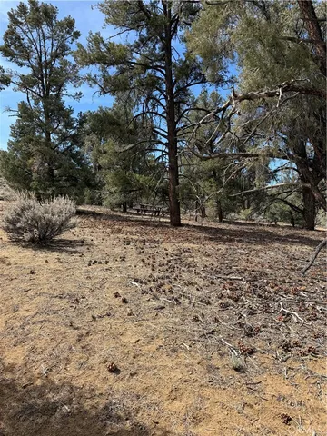 a view of mountain with sunset
