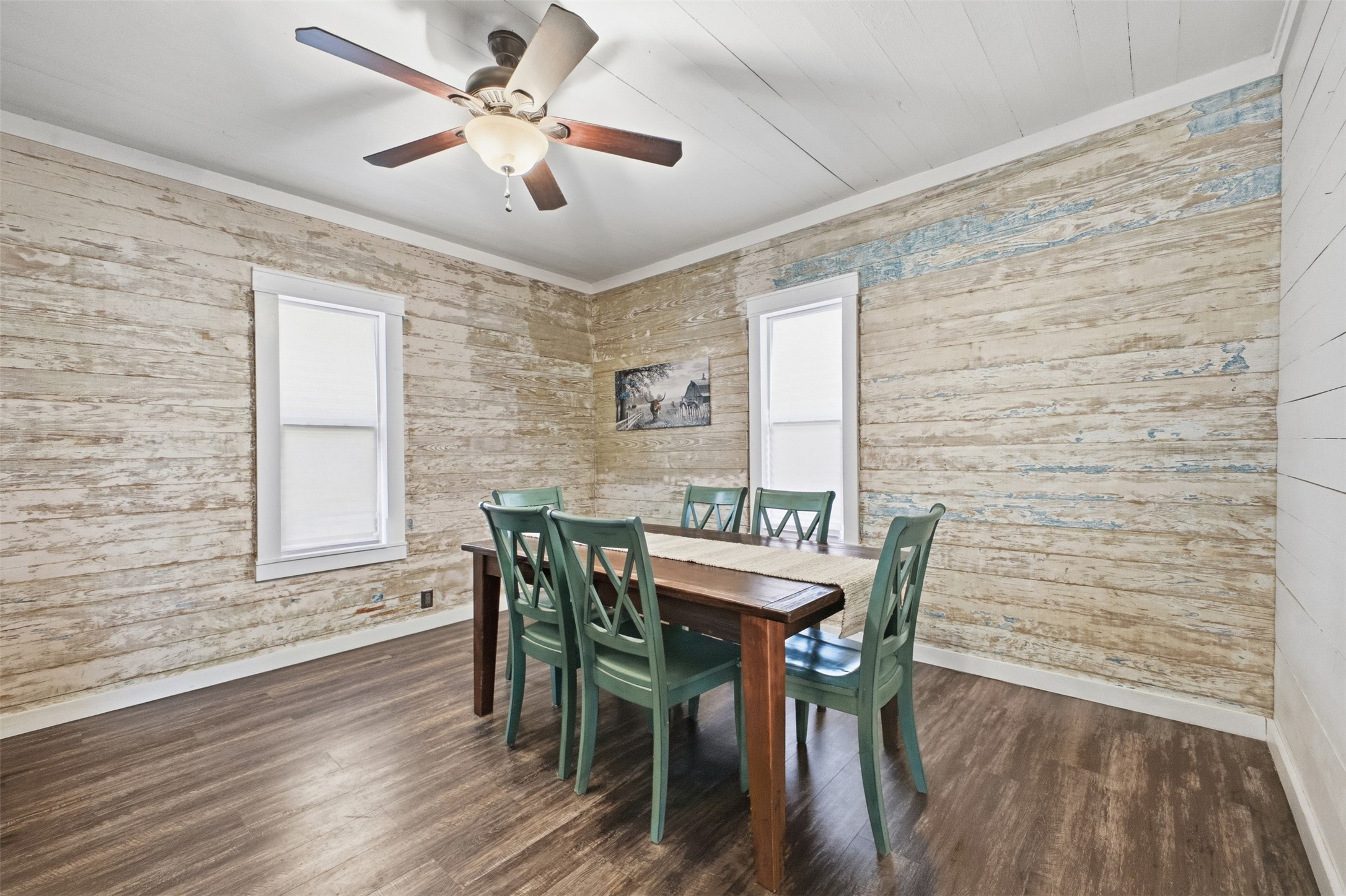 1903 Tigerpoint Road Brenham, TX 77833 - Photo 6 of 27 a view of a dining room with furniture and wooden floor