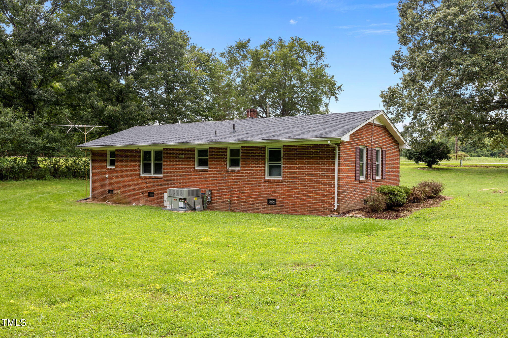 1050 Rock Spring Church Road Henderson, NC 27537 - Photo 15 of 24 a front view of a house with yard and green space