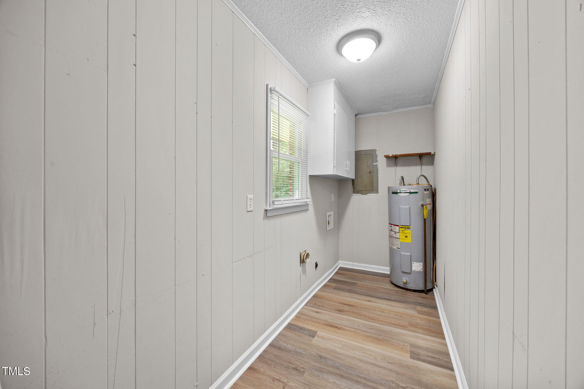 1050 Rock Spring Church Road Henderson, NC 27537 - Photo 8 of 24 a view of a storage & utility room with washer and dryer