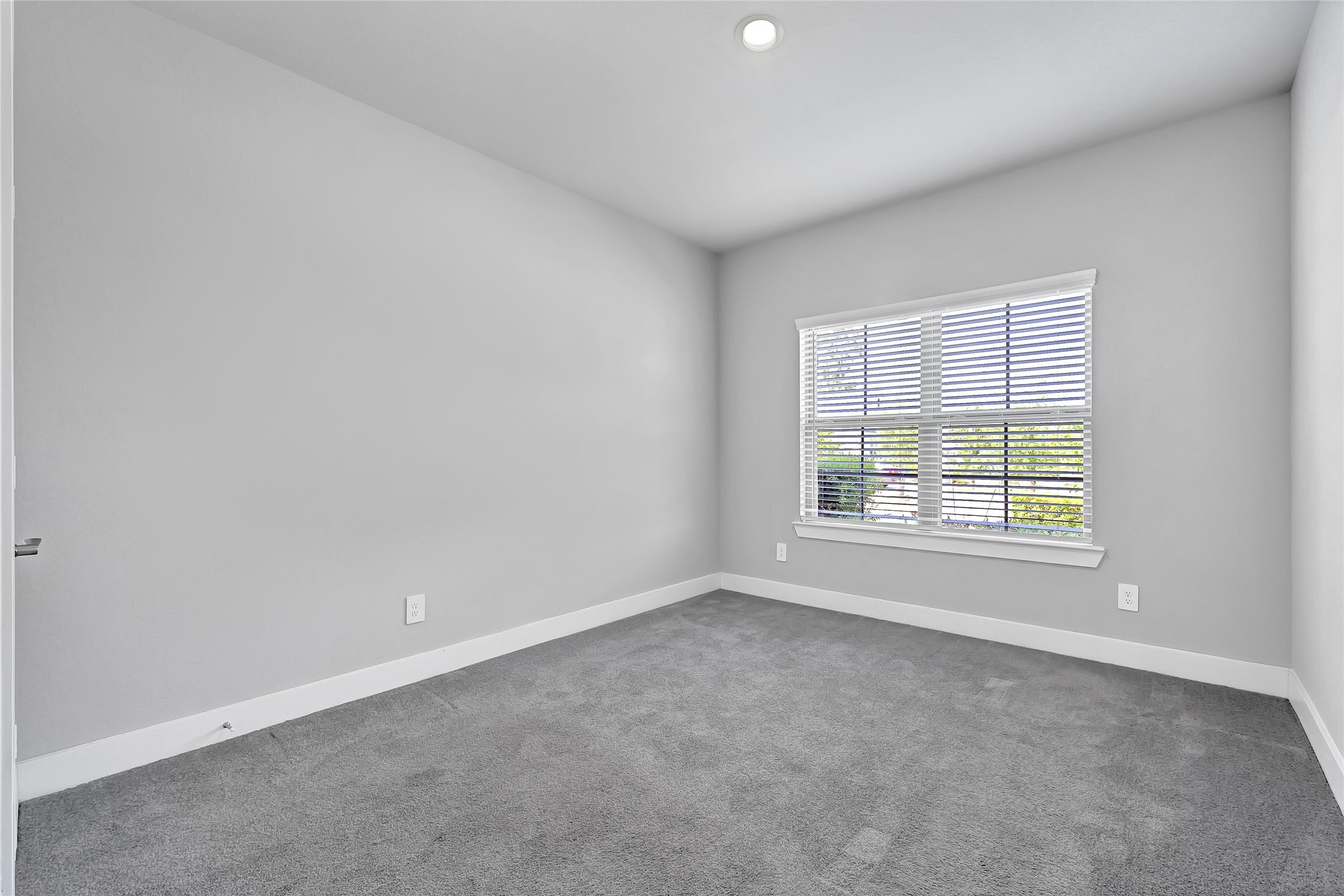 10329 South Goshawk Trail Conroe, TX 77385 - Photo 23 of 46 an empty room with a window
