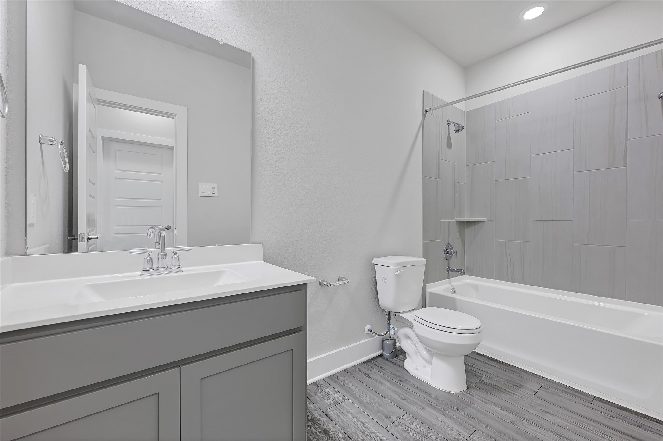 10329 South Goshawk Trail Conroe, TX 77385 - Photo 25 of 46 a bathroom with a sink toilet and shower