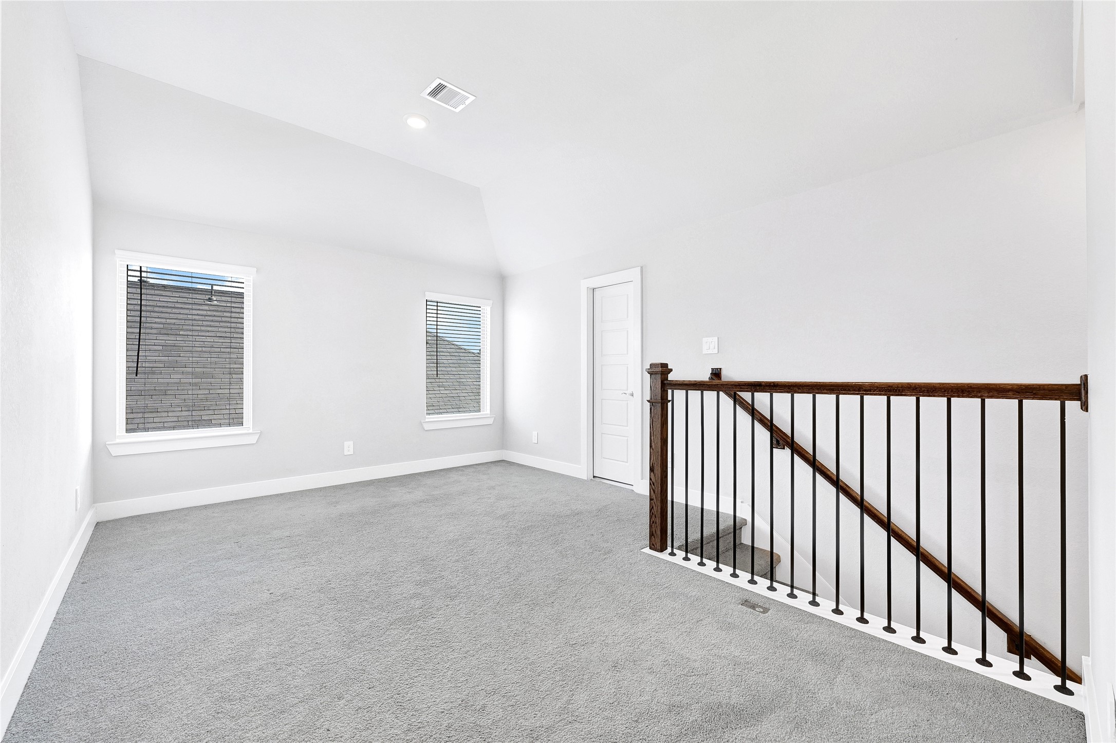 10329 South Goshawk Trail Conroe, TX 77385 - Photo 29 of 46 a view of a livingroom with a staircase