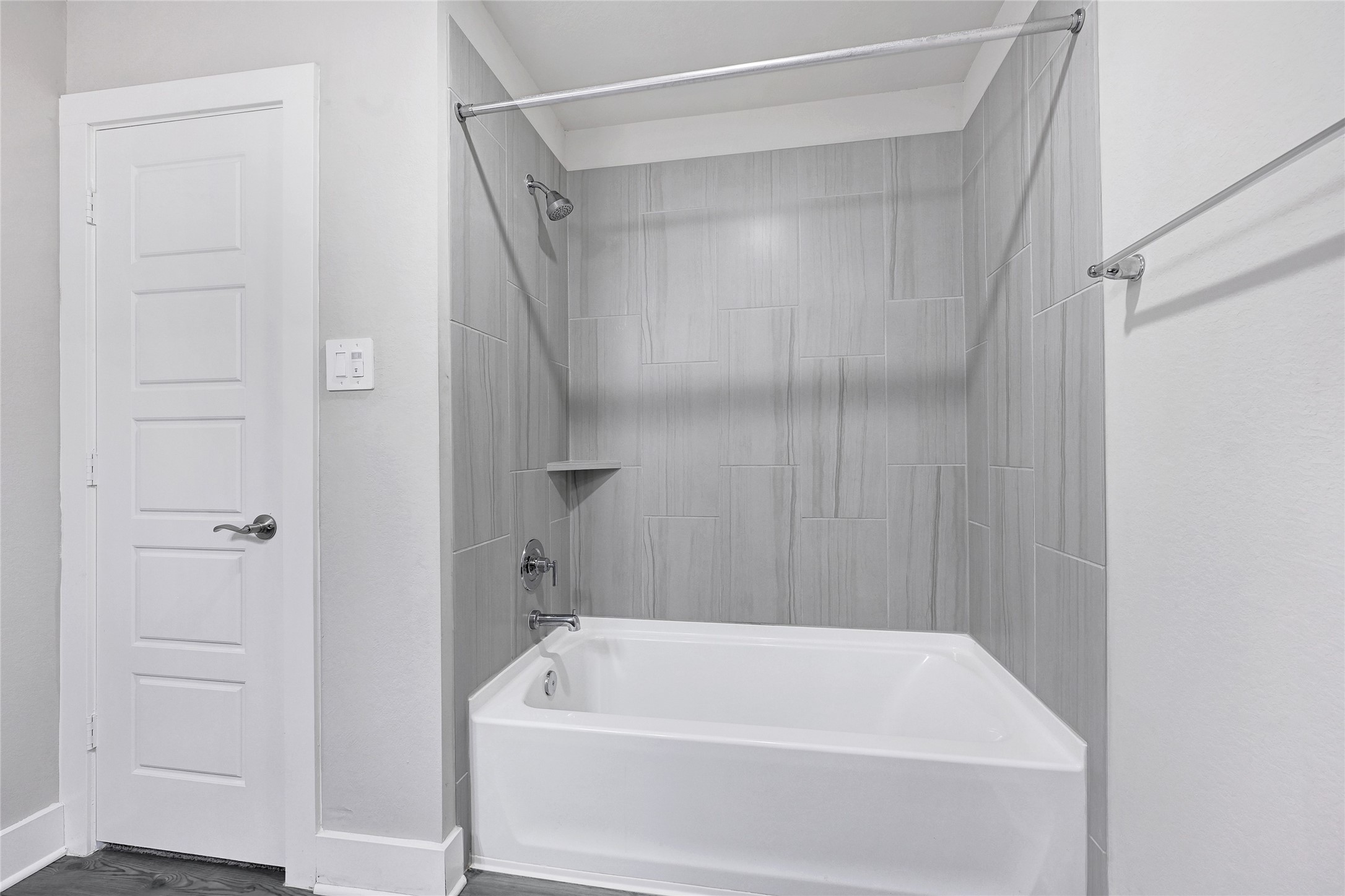 10329 South Goshawk Trail Conroe, TX 77385 - Photo 33 of 46 a bathroom with a tub and a shower